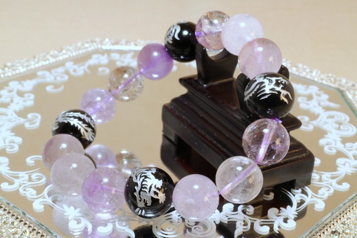 四神彫りオニキスとスーパーセブンのブレスレット