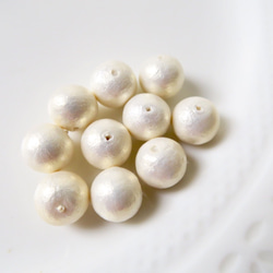 棉珍珠-10mm象牙白10顆 (雙孔) 第2張的照片