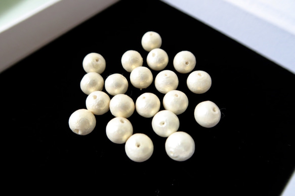 棉珍珠-10mm象牙白20顆 (雙孔) 第4張的照片