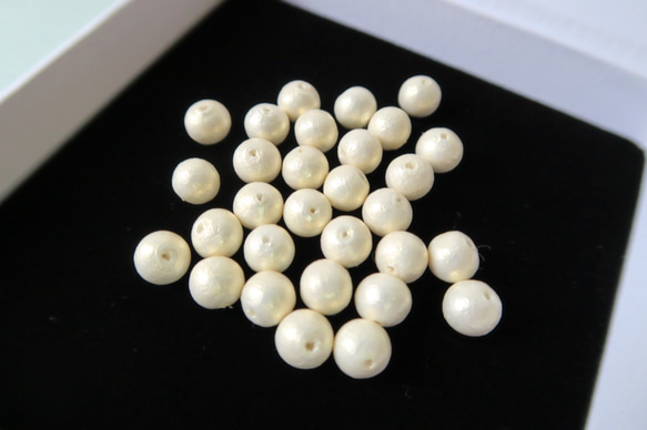 棉珍珠-10mm象牙白30顆(雙孔) 第3張的照片