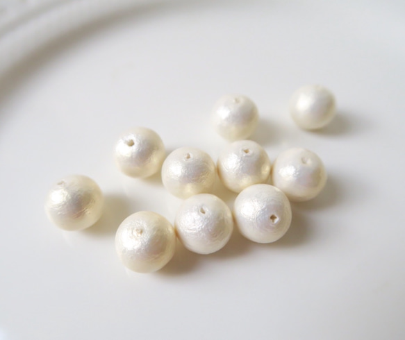 棉珍珠-10mm象牙白40顆(雙孔) 第3張的照片