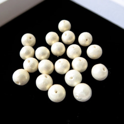 棉珍珠-12mm象牙白20顆(雙孔) 第4張的照片