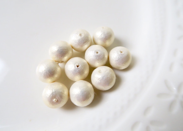 棉珍珠-12mm象牙白30顆 (雙孔) 第2張的照片