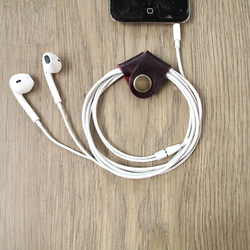 iPhoneヘッドホンコード収納x EarPhone （紫） 1枚目の画像