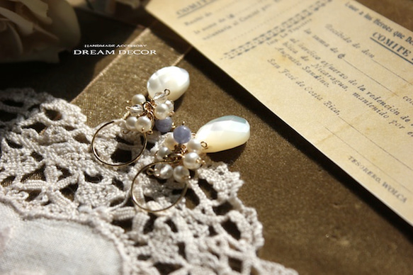 14kgf Snow Tuffy〜貝殼，淡水珍珠和坦桑石耳環 第2張的照片