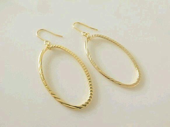 oval ring pierces gold 1枚目の画像