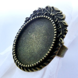 ＜再々‥販＞18×13mmカボション用　リボンフレームリング台　フリーサイズ(金古美) 1枚目の画像