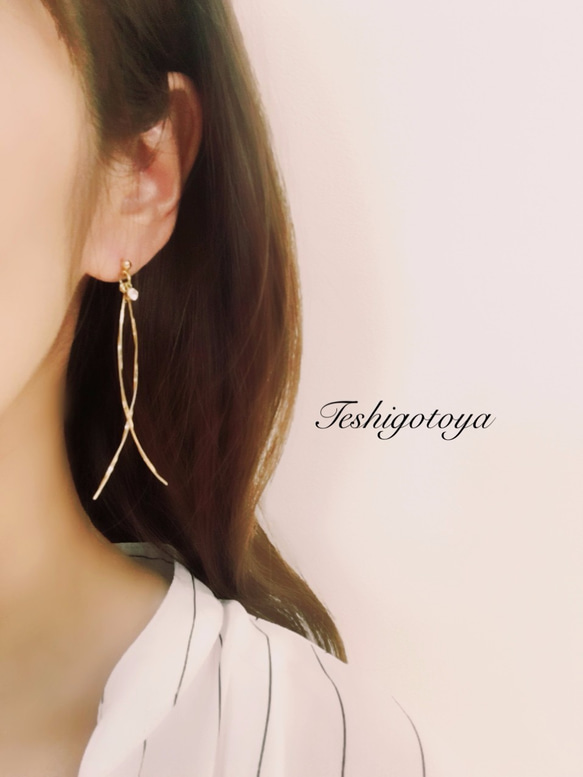 twist  wave stick earring / pierce 1枚目の画像