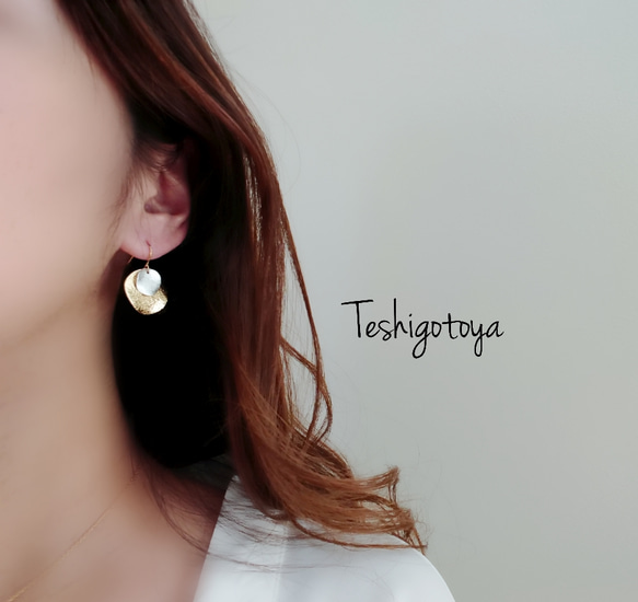 14kgf Stardust circle plate pierce 2枚目の画像