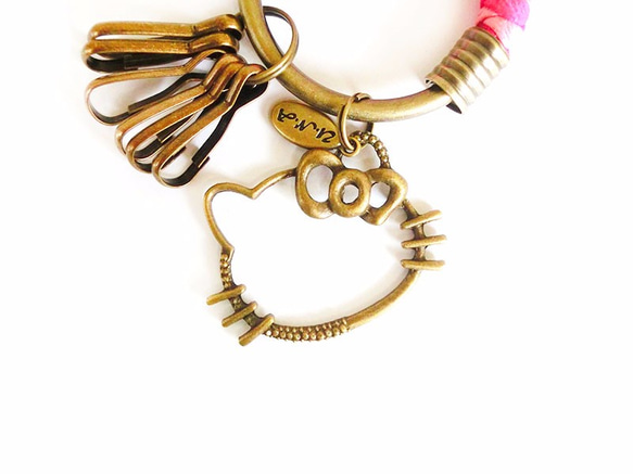 【UNA-優娜手作】 鑰匙圈(小)5.3CM 桃紅＋粉紅+簍空KITTY貓 手工 編織 腊繩 鐵環 客製化 第2張的照片