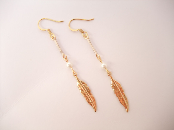 feather earrings 1枚目の画像