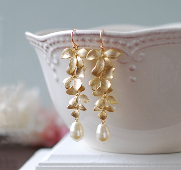 施華洛世奇奶油色珍珠和金花耳環 第1張的照片