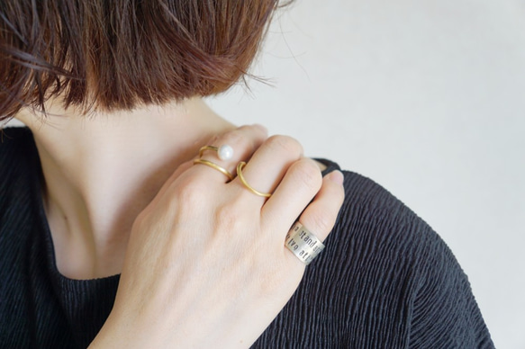 黃銅雙環“類似” 第1張的照片