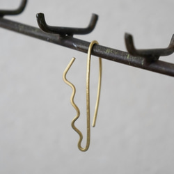 黃銅製成的耳套“放” 第7張的照片