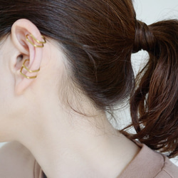 黃銅耳套“假定”男女通用 第2張的照片