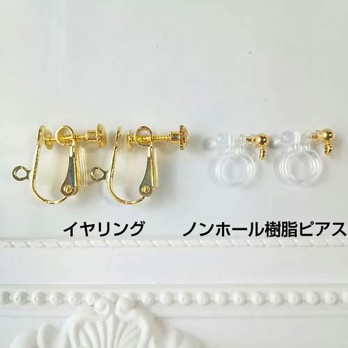 星の砂と琉球ガラスのガラスドームピアスorイヤリングの通販 by