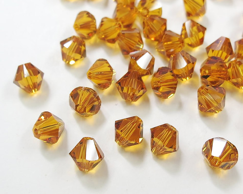 スワロフスキー】ソロバンビーズ トパーズ 3mm 20粒入 ビジュー