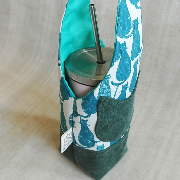 謎樣綠貓-水壺袋/保溫杯袋/傘袋 第4張的照片