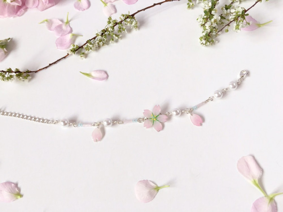 *Haku‧Neko* [さくらの花限定シリーズ]ピンクの桜の花びらを淡雨真珠のブレスレットの小さな手とチェーン[15/8にCu 1枚目の画像