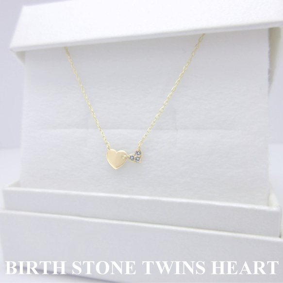 三月生日石海藍寶石雙胞胎心形小吊墜和閃閃發光的精緻鏈條黃金項鍊 第6張的照片