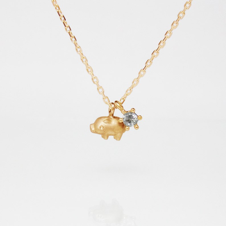 とっても小さな子ブタとダイヤ0.1ctのK18YGペンダント < Fhilippe.Jr【フィリップ.Jr】>