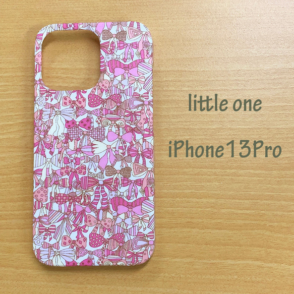 【リバティ生地】ジェニーズ・リボンズピンク iPhone 13 Pro 1枚目の画像