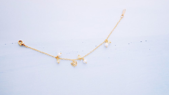 萌黃--嫩黃貴石珍珠蝴蝶結綴飾手鍊 第2張的照片