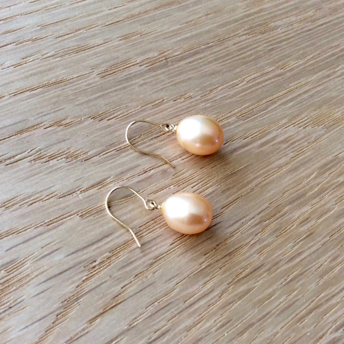 たまごみたいなオレンジ淡水パールのピアス K18YG ピアス（フック