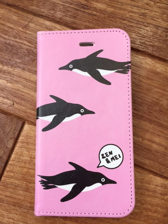 名入れできます。iphone6・７・８手帳型ケース　飛ぶペンギン 2枚目の画像