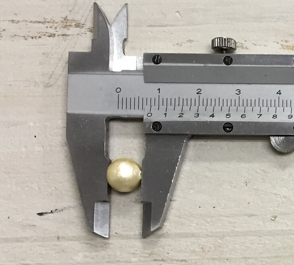 【100個】上質 コットンパール 0.8mm 両穴あり 2枚目の画像