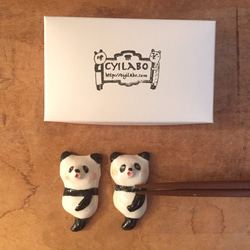 筷子休息組兩個大熊貓 第1張的照片