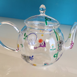 玻璃茶壺花和考拉 第3張的照片