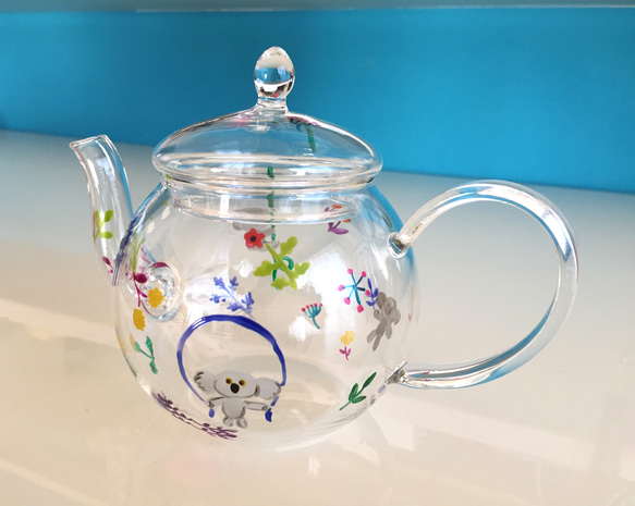 玻璃茶壺花和考拉 第4張的照片