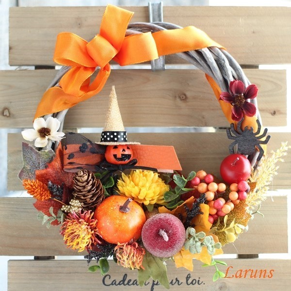 パンプキン＆木の実たくさんの　オレンジハロウィン造花リース ハロウィン オレンジ色のニゲラのリース：木の実 パンプキン