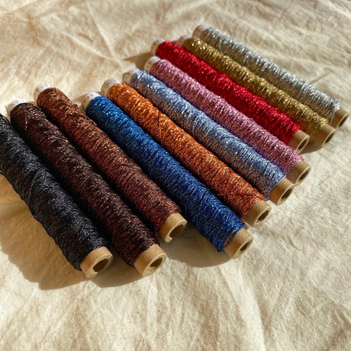 ステッチ＆ステッチシガレット巻 25m 〈青ラメ 25〉 糸・ミシン