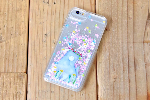 ふてネコが花畑にたたずむグリッタースマホケース＊iPhone全機種対応/Xperia XZ1 Compact 1枚目の画像