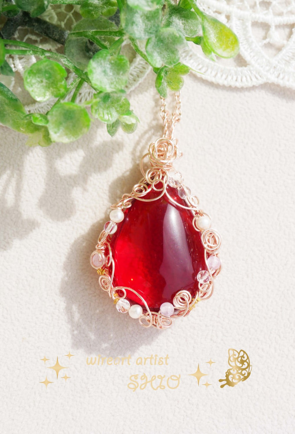 シラー入り　赤い琥珀　ペンダント　トップ シラー入り 赤い琥珀 ペンダント トップ