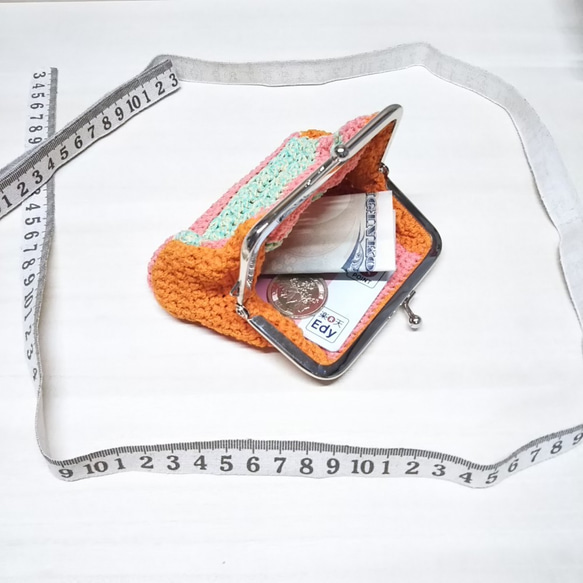 草原に夕焼け⁉　四角い横長　がま口　てのひらサイズ【手編み一点物】 3枚目の画像