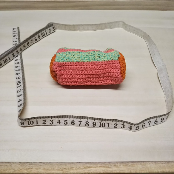 草原に夕焼け⁉　四角い横長　がま口　てのひらサイズ【手編み一点物】 8枚目の画像