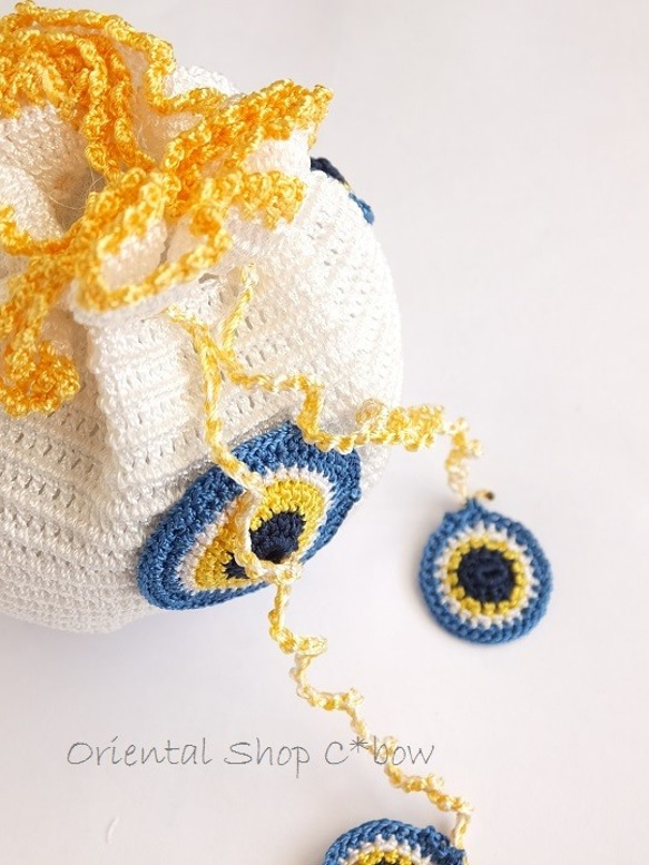 手編みナザルボンジュウのミニ巾着｜白色×卵 3枚目の画像