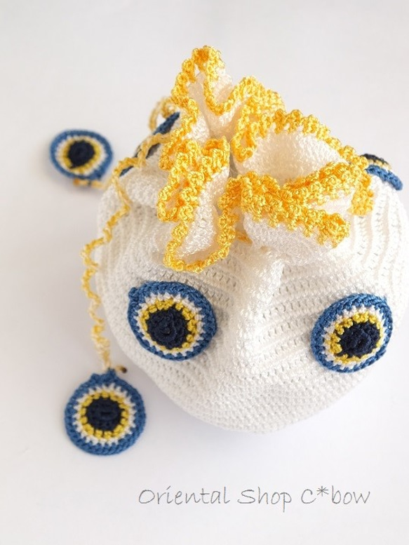 手編みナザルボンジュウのミニ巾着｜白色×卵 4枚目の画像