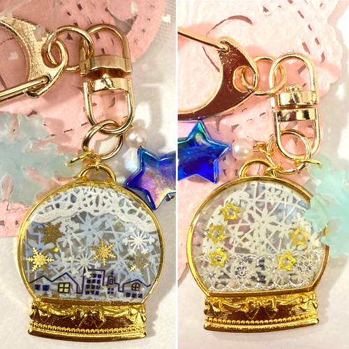 送料無料*スノードーム風雪の結晶と冬の街並みキーホルダー