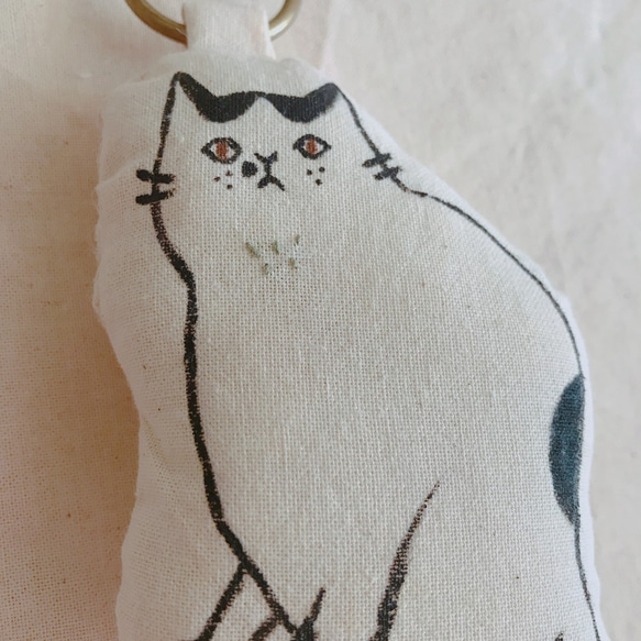 wootopia 乳牛喵喵手繪吊飾（可客製） 第2張的照片