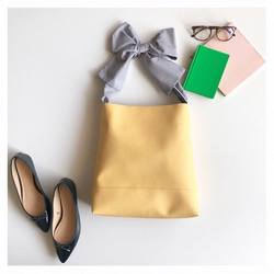 【sold out】《3way》ribbon tote bag （ecoleather egg yellow） 1枚目の画像