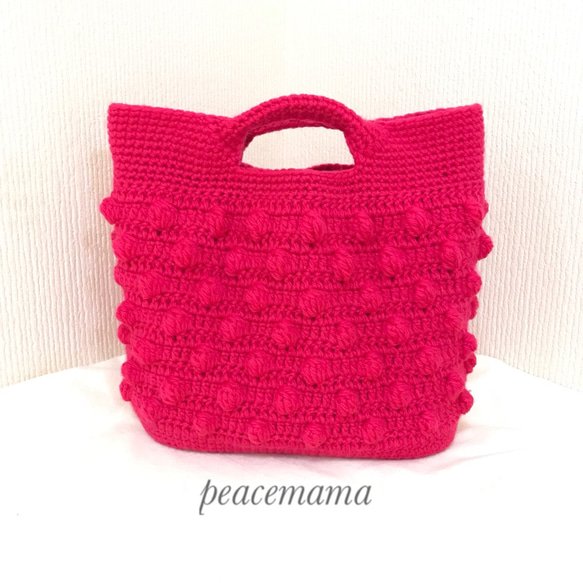 【再値下げ】《送料無料》濃いピンクの玉編み毛糸バッグ 1枚目の画像