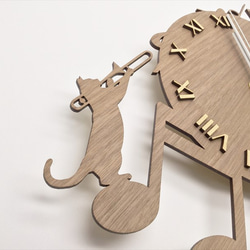 ちいさな掛け時計（トロンボーン猫） 3枚目の画像