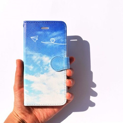 青空と紙飛行機iPhone用手帳型ケース 1枚目の画像