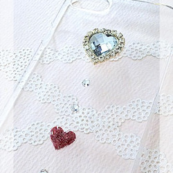 赤いHEARTとSWAROVSKI　の全機種対応　スマホケース 2枚目の画像