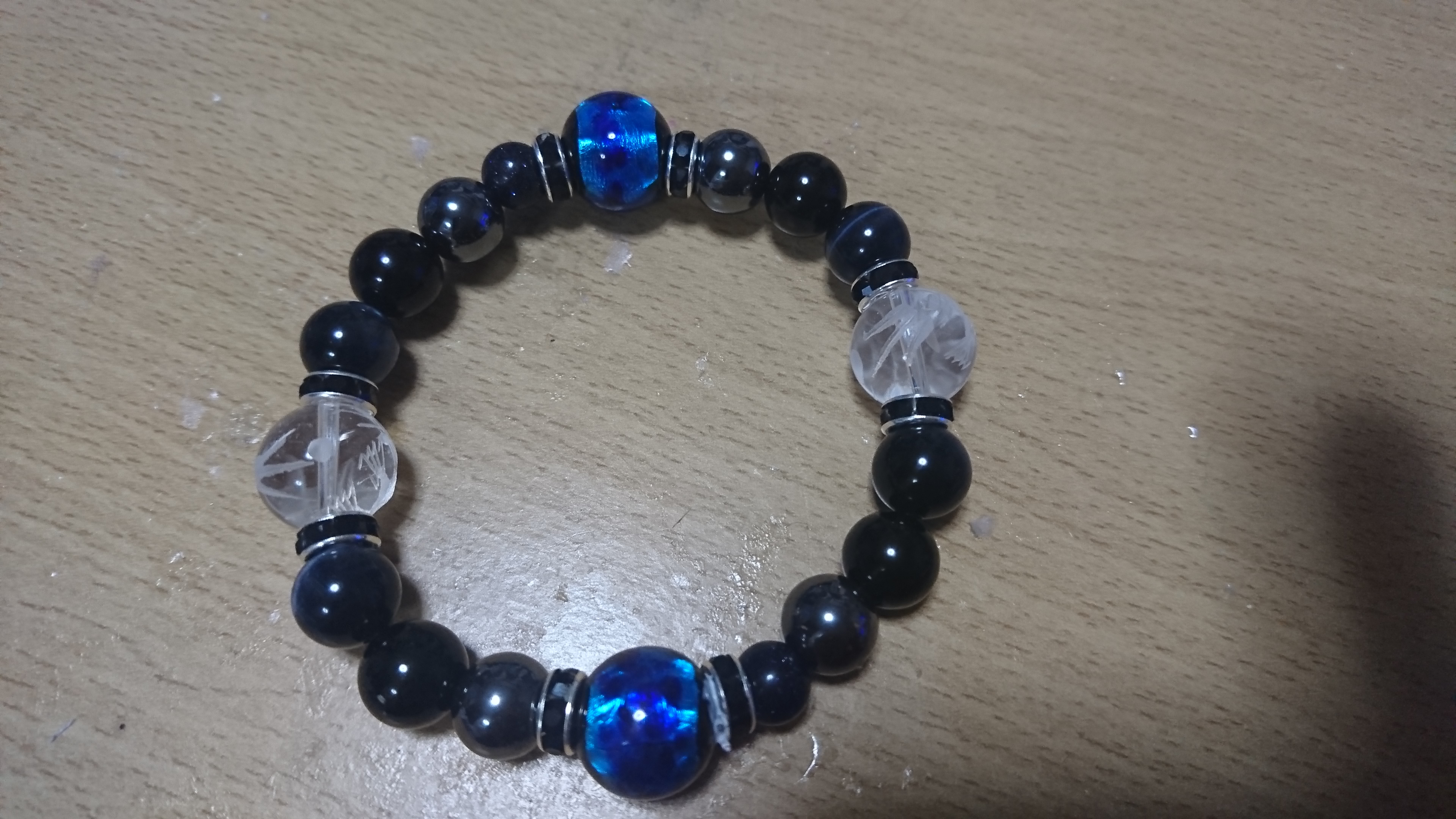 夜光石と青龍彫水晶のブレスレット