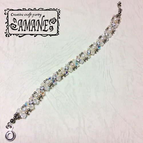 スワロフスキーとキュービックジルコニアのテグス編みブレスWH